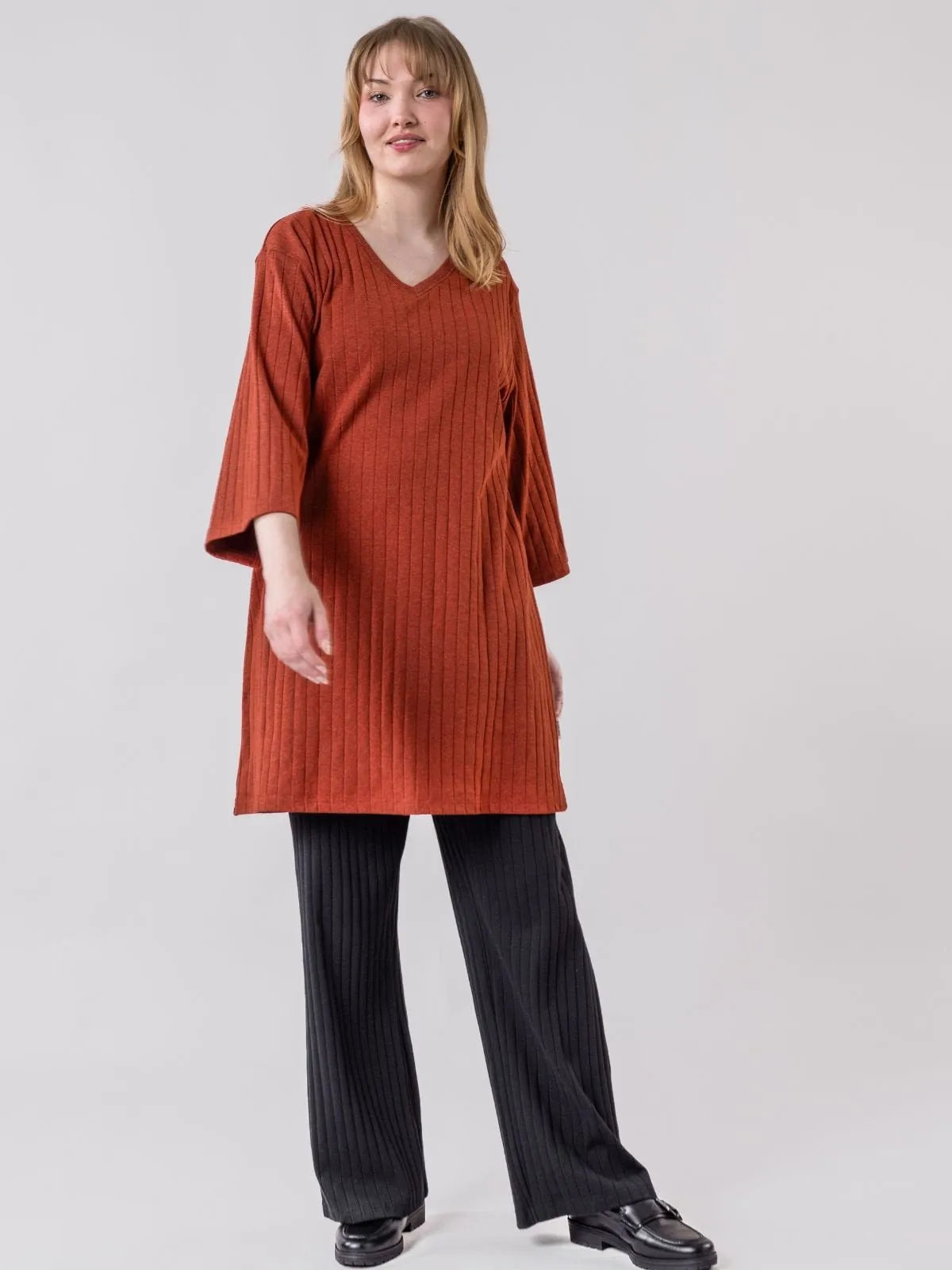 Globe Hope, Suvanto tunika, mecca oranssi, asukuva liikkessä.